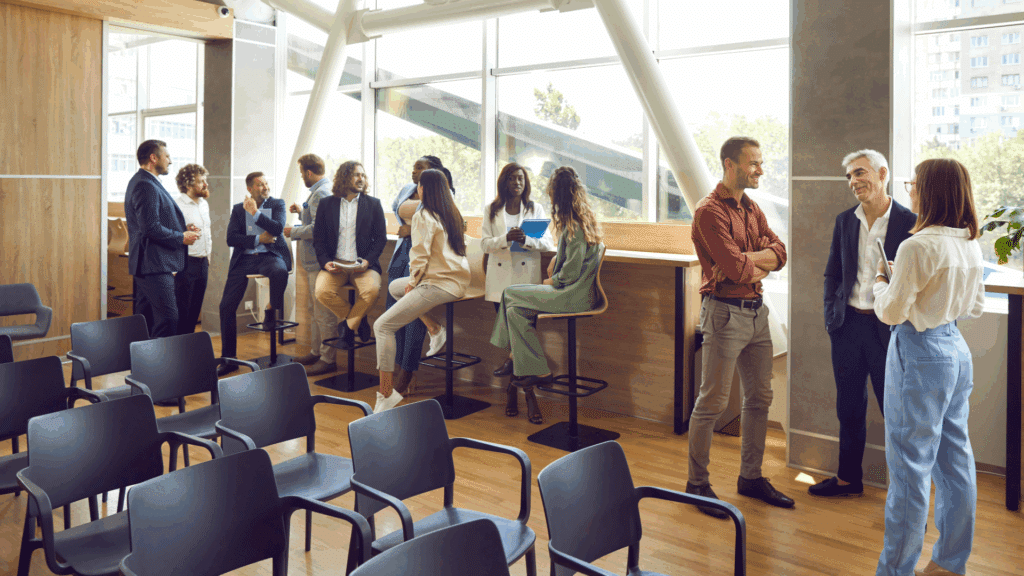 people in a room talking and networking