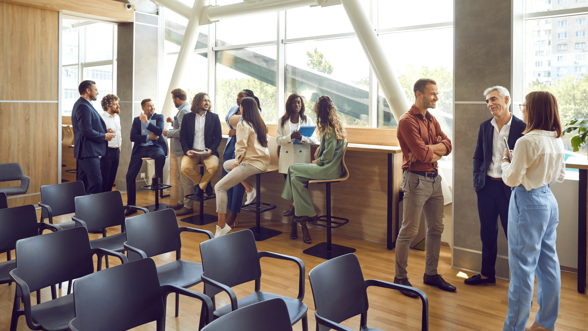 people in a room talking and networking