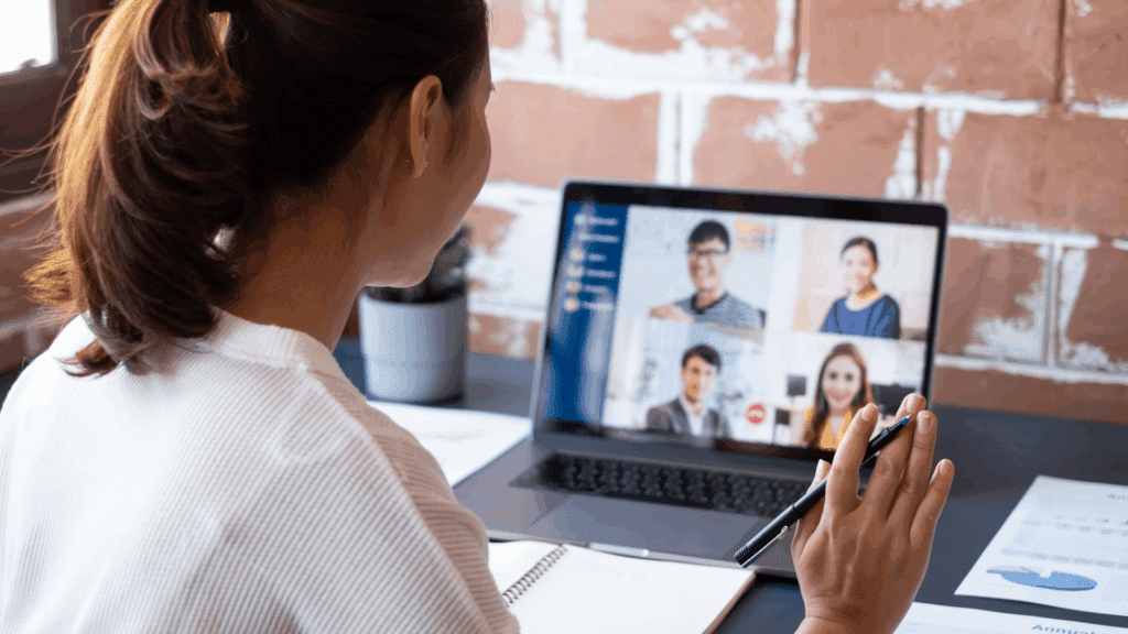 woman talking to team on video call